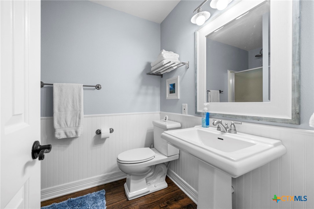 2509 Forest Trail Temple, TX 76502 - Photo 23 of 42 a bathroom with a sink toilet and mirror