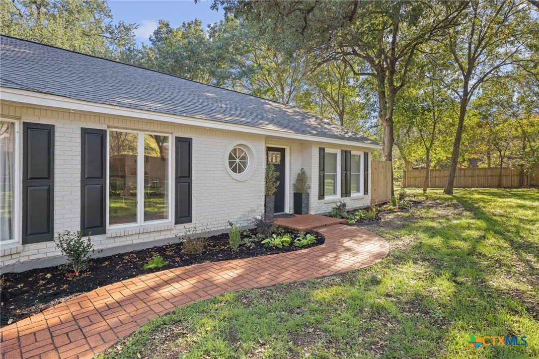 2509 Forest Trail Temple, TX 76502 - Photo 31 of 42 a front view of a house with garden