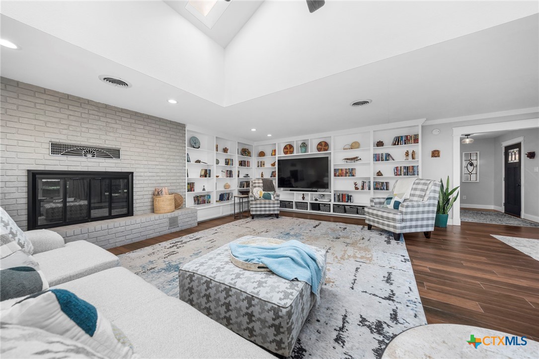 2509 Forest Trail Temple, TX 76502 - Photo 6 of 42 a living room with furniture and a flat screen tv