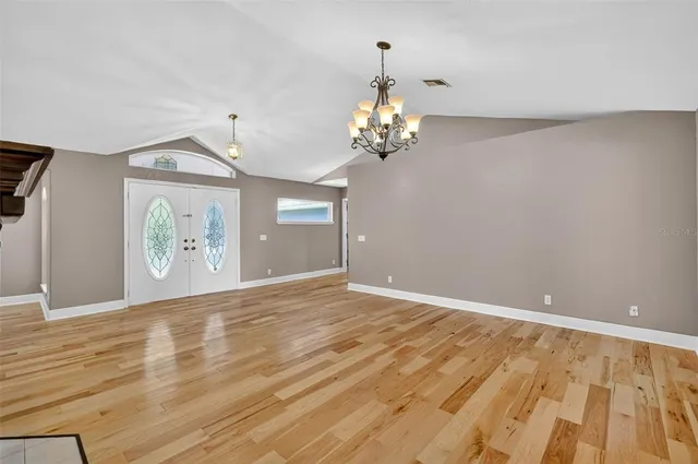 a kitchen with granite countertop a sink and a counter space