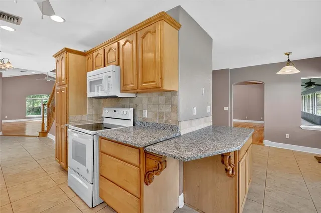 a view of a kitchen with a sink