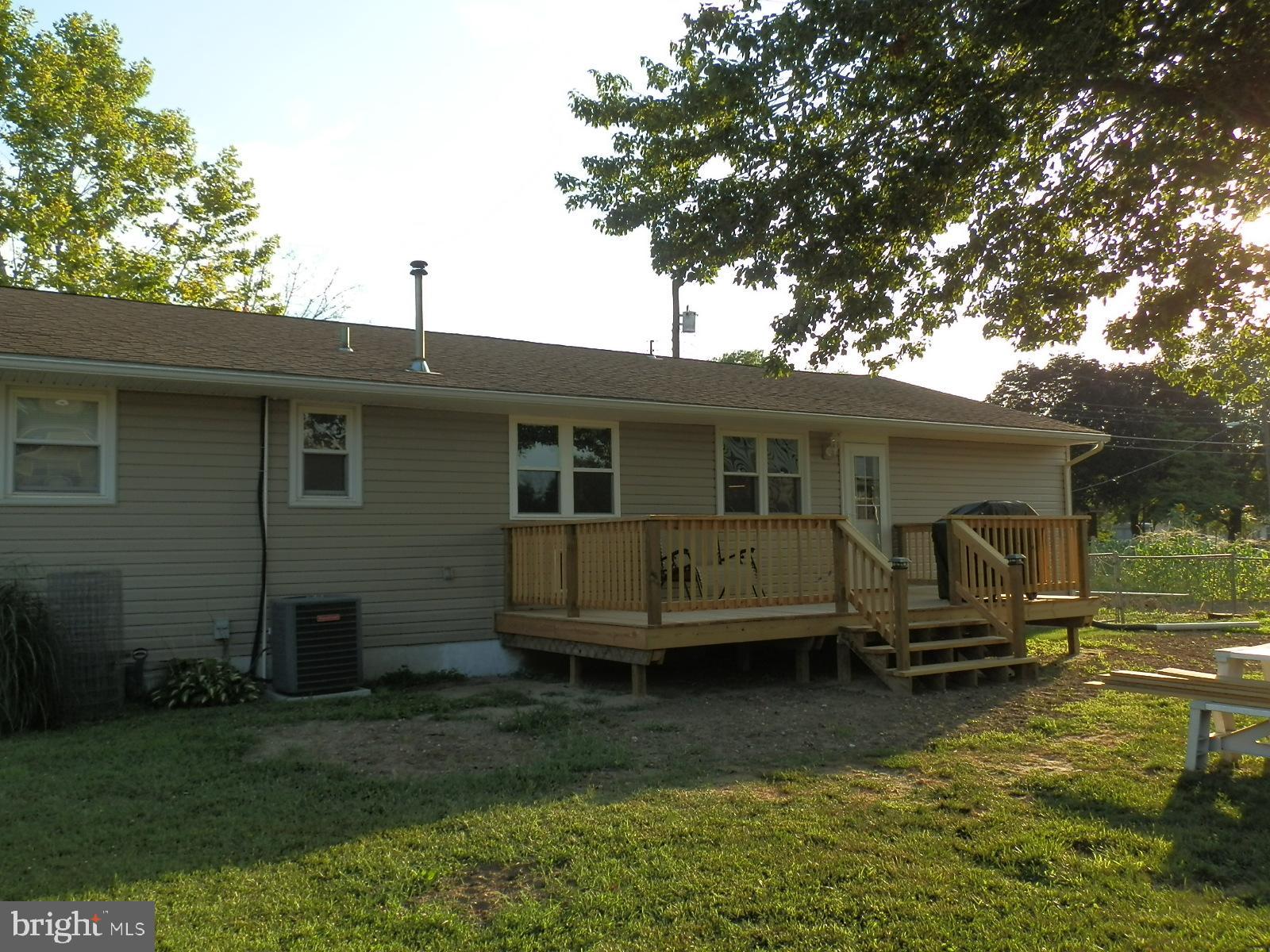 10 Georgia Road Pennsville, NJ 08070 - Photo 16 of 48 a view of a house with a yard
