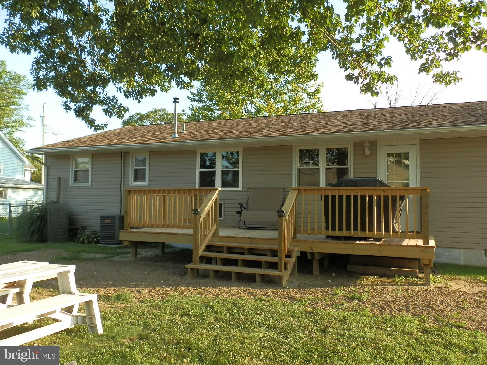 10 Georgia Road Pennsville, NJ 08070 - Photo 21 of 48 a view of a house with a backyard