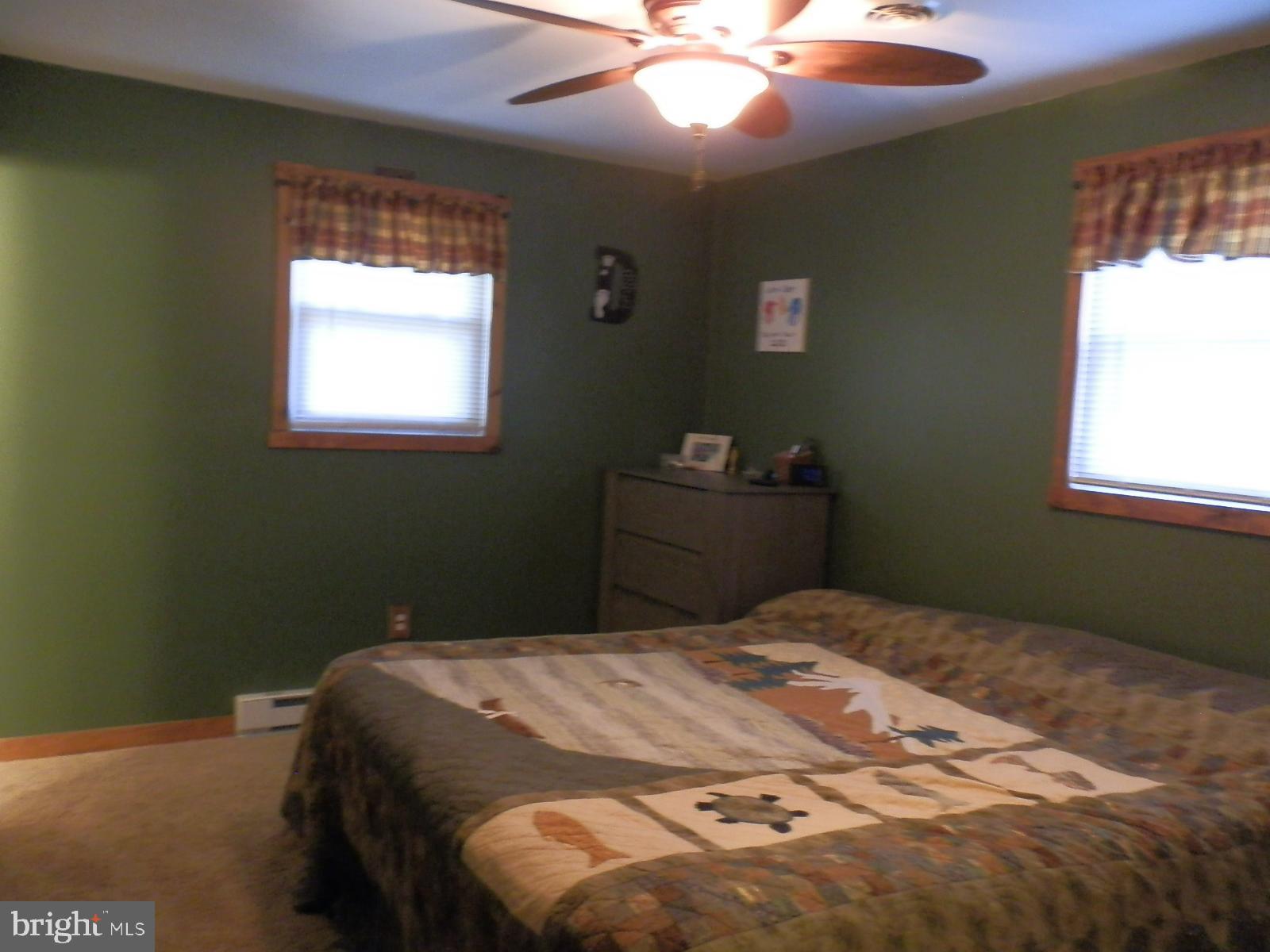10 Georgia Road Pennsville, NJ 08070 - Photo 26 of 48 a bedroom with a bed and a window