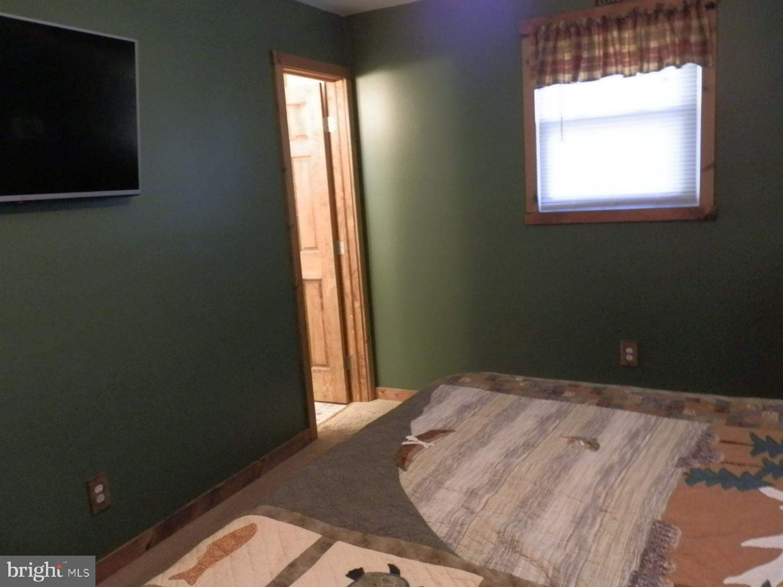 10 Georgia Road Pennsville, NJ 08070 - Photo 27 of 48 a bedroom with a bed and a window