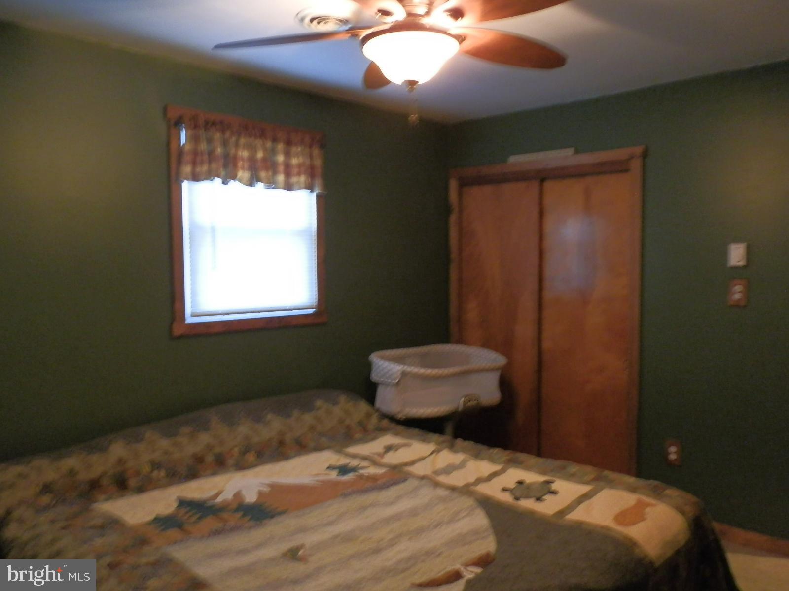 10 Georgia Road Pennsville, NJ 08070 - Photo 31 of 48 a bedroom with a bed and a window