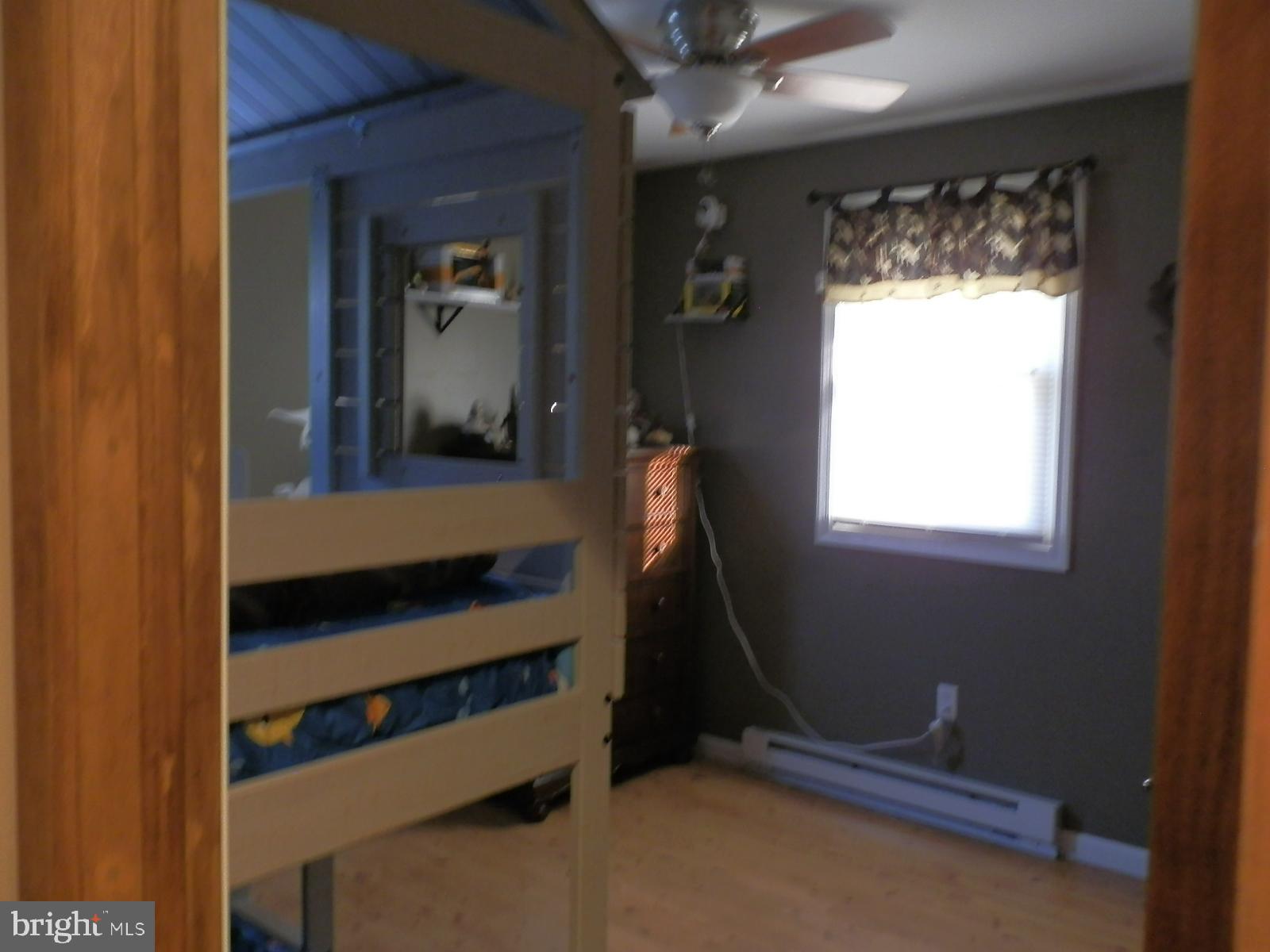10 Georgia Road Pennsville, NJ 08070 - Photo 32 of 48 a room with window and a table