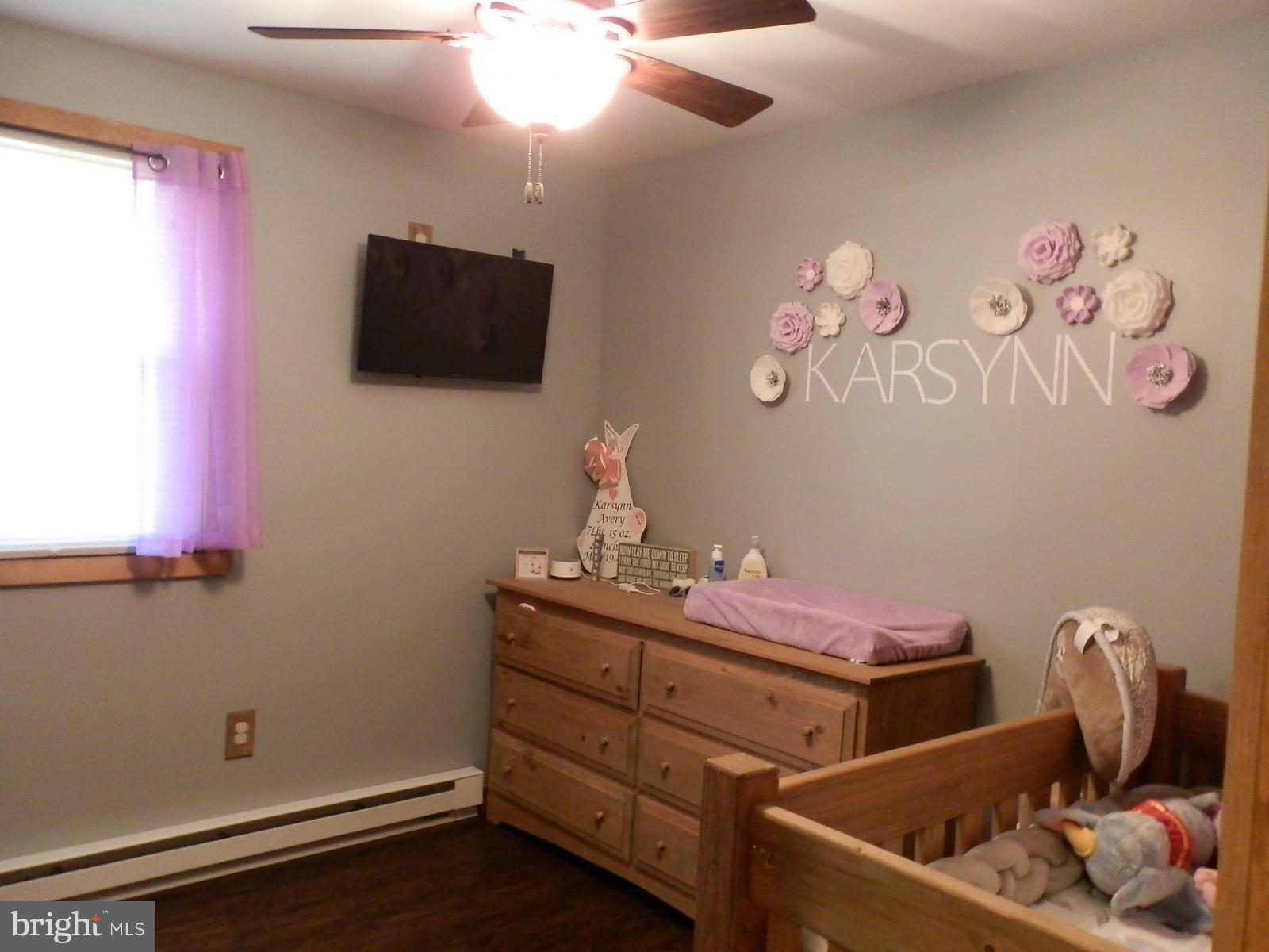 10 Georgia Road Pennsville, NJ 08070 - Photo 38 of 48 a room with toys and flat screen tv