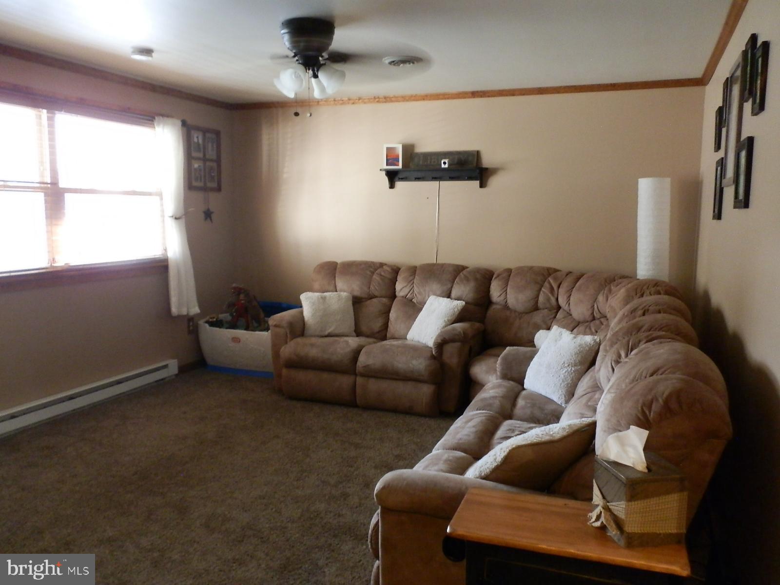 10 Georgia Road Pennsville, NJ 08070 - Photo 41 of 48 a living room with furniture and a window