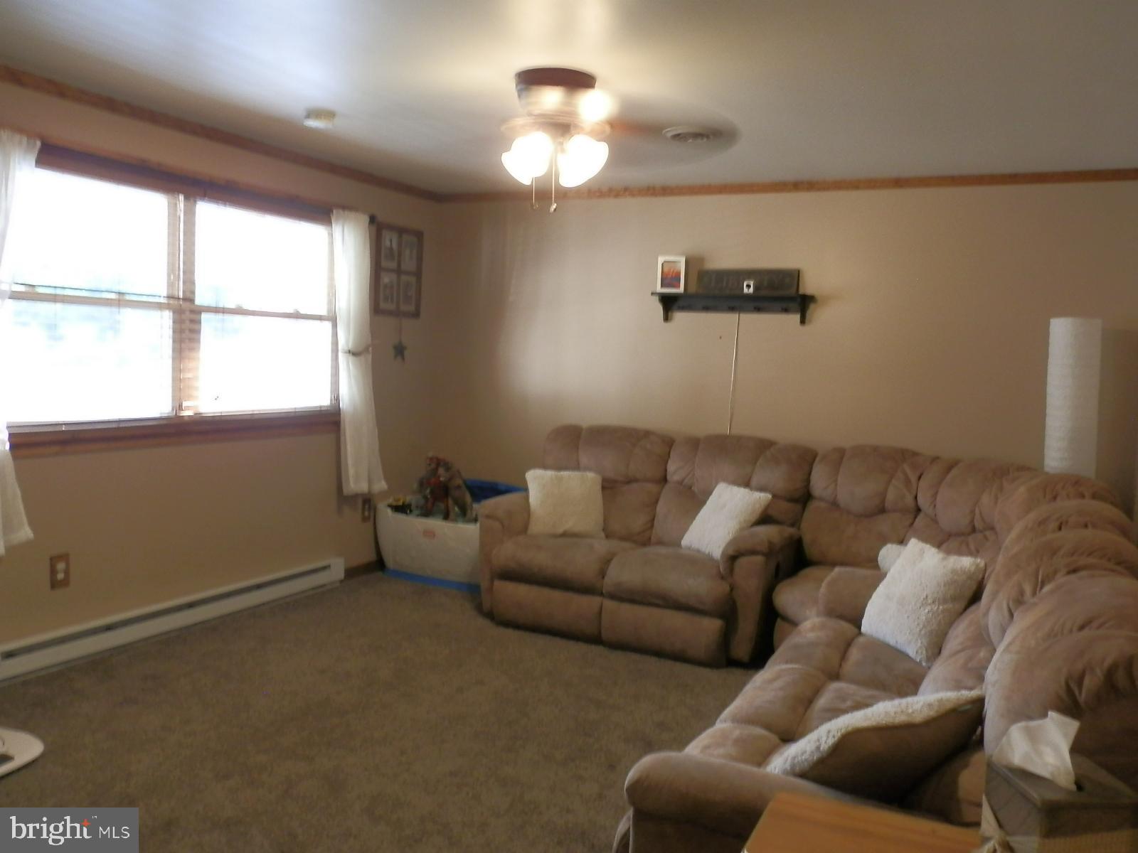 10 Georgia Road Pennsville, NJ 08070 - Photo 45 of 48 a living room with furniture and a window