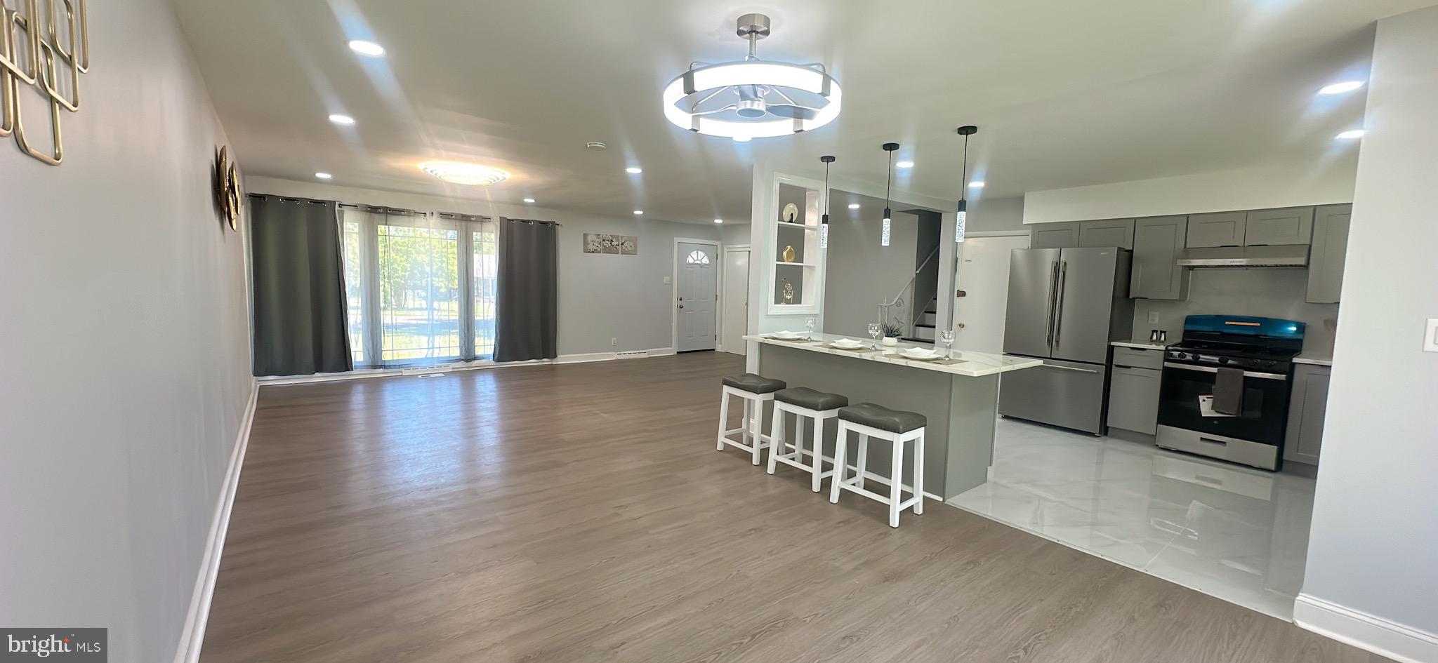 1242 June Road Huntingdon Valley, PA 19006 - Photo 2 of 47 a large kitchen with a table and chairs