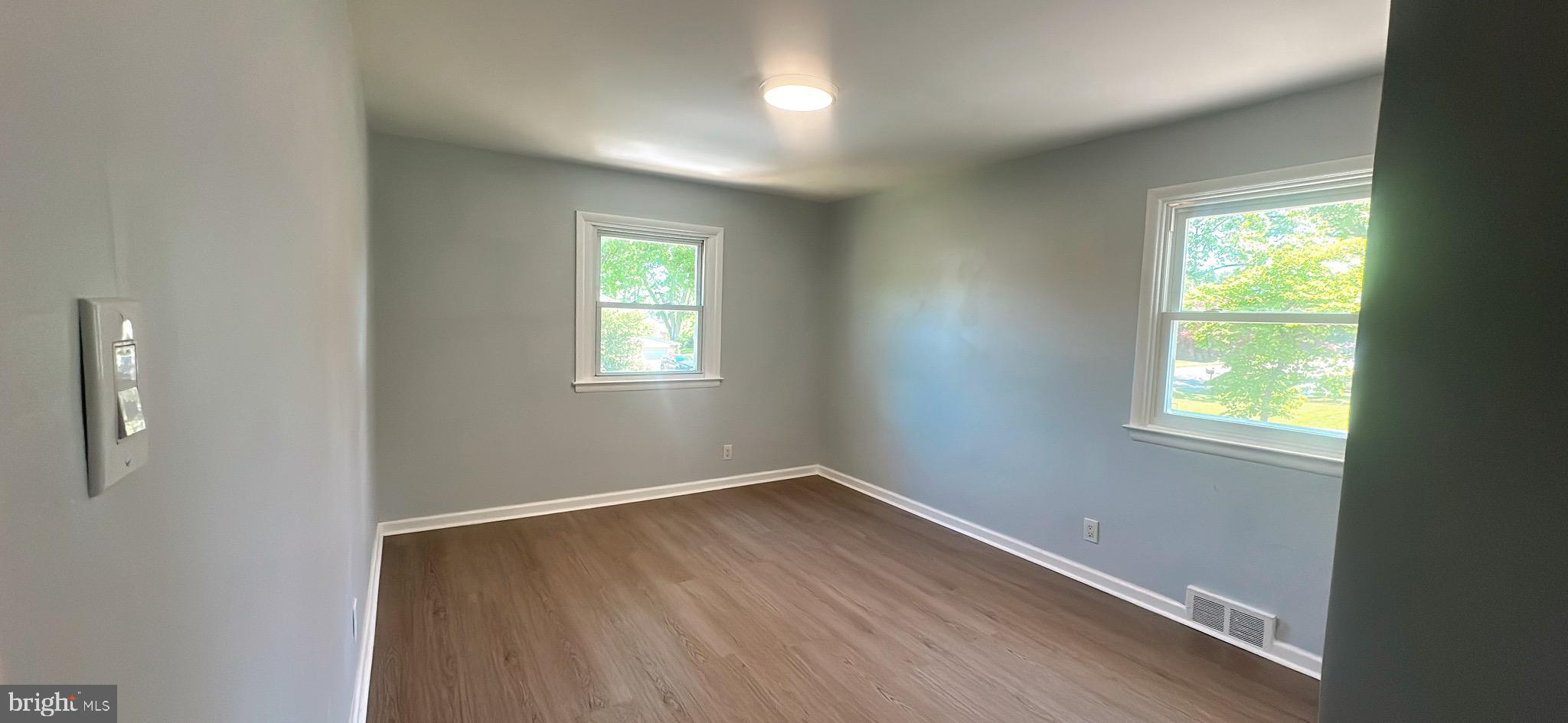 1242 June Road Huntingdon Valley, PA 19006 - Photo 27 of 47 an empty room with windows