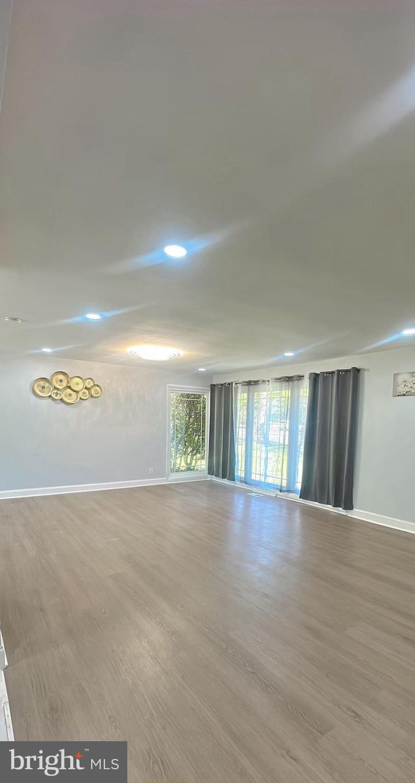 1242 June Road Huntingdon Valley, PA 19006 - Photo 9 of 47 a view of a room with wooden floor
