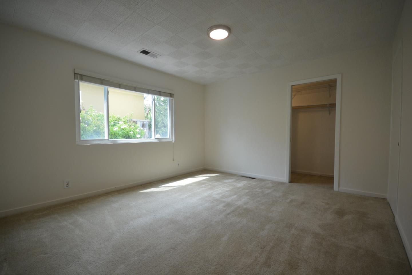 224 Park Boulevard Millbrae, CA 94030 - Photo 12 of 17 an empty room with windows