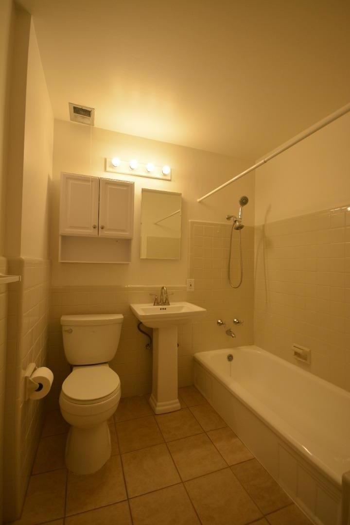 224 Park Boulevard Millbrae, CA 94030 - Photo 9 of 17 a bathroom with a sink a toilet and shower