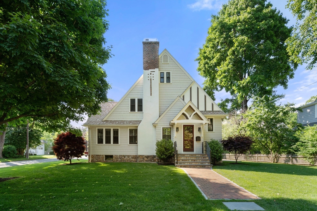 39 Ingraham Road Wellesley, MA 02482 - Photo 1 of 30 a front view of a house with a yard