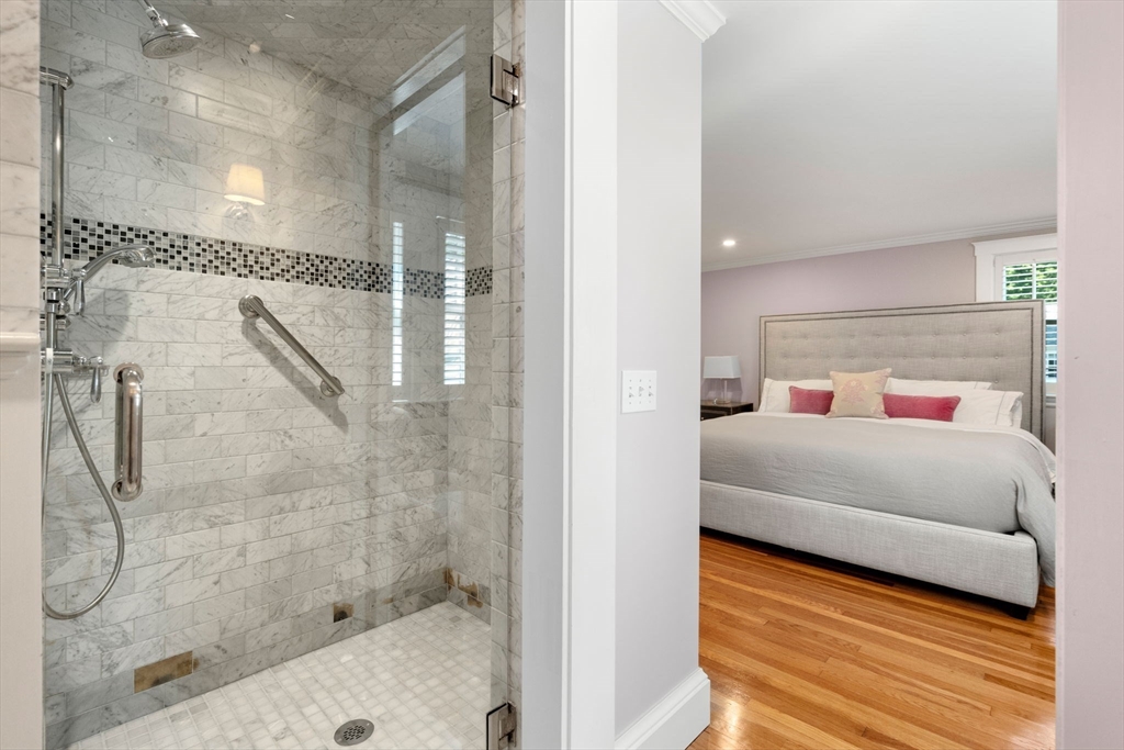 39 Ingraham Road Wellesley, MA 02482 - Photo 16 of 30 a bedroom with a bed and a mirror