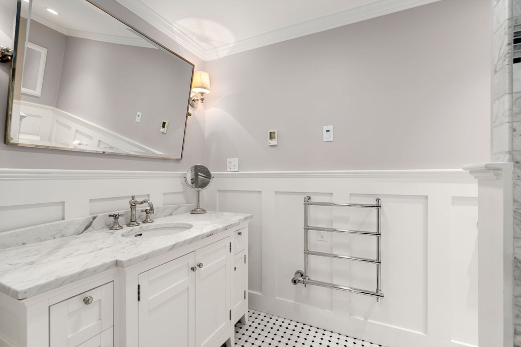 39 Ingraham Road Wellesley, MA 02482 - Photo 17 of 30 a bathroom with a sink a vanity and a mirror