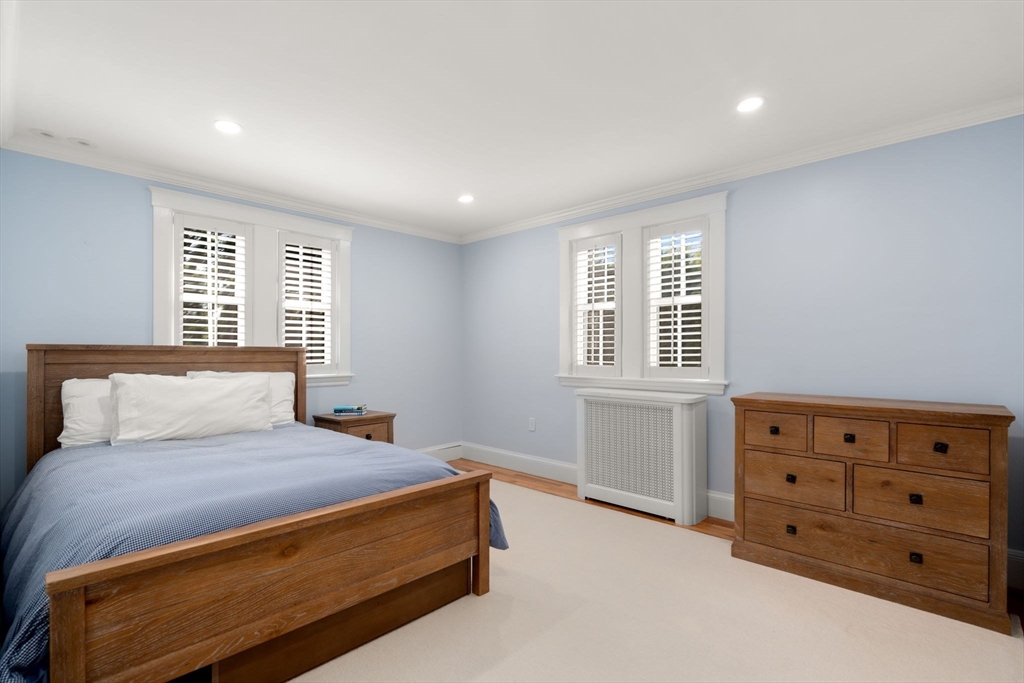 39 Ingraham Road Wellesley, MA 02482 - Photo 18 of 30 a bedroom with a bed and a dresser