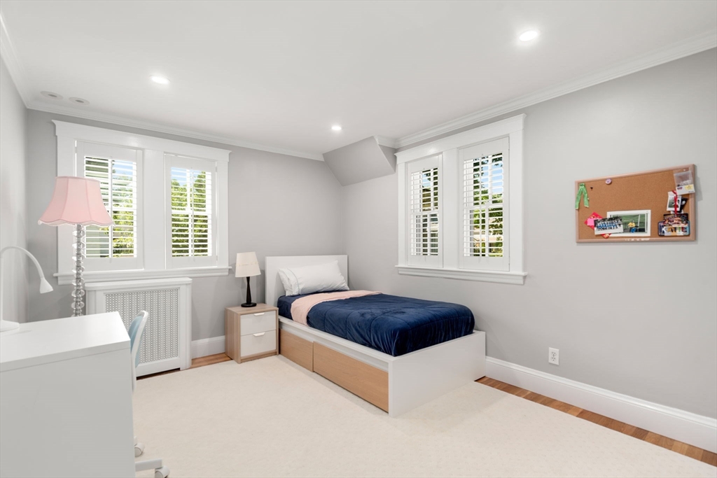 39 Ingraham Road Wellesley, MA 02482 - Photo 19 of 30 a spacious bedroom with a large bed and a window