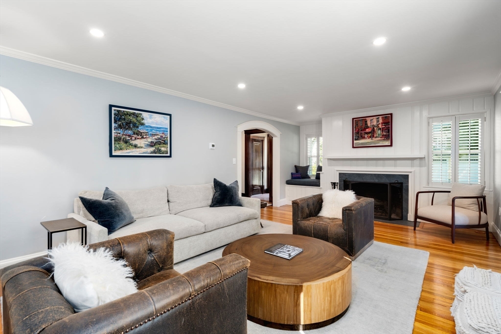 39 Ingraham Road Wellesley, MA 02482 - Photo 2 of 30 a living room with furniture and a fireplace