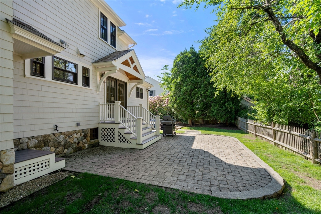 39 Ingraham Road Wellesley, MA 02482 - Photo 27 of 30 a view of a house with a yard and sitting area