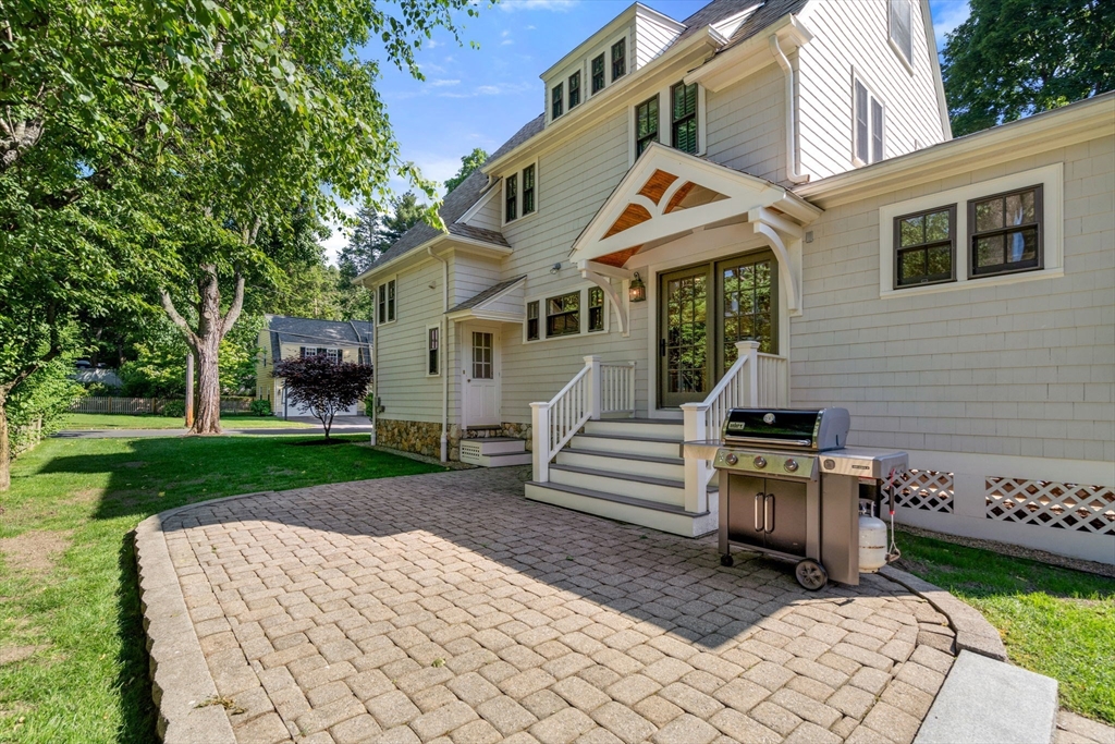 39 Ingraham Road Wellesley, MA 02482 - Photo 28 of 30 a view of a house with backyard and sitting area