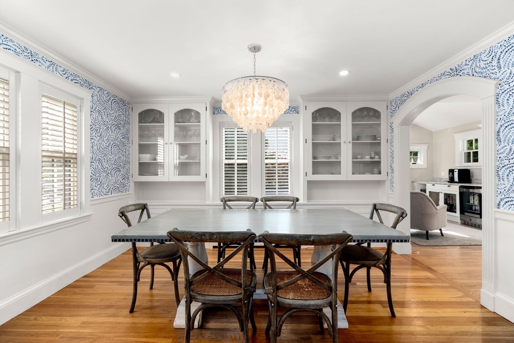 39 Ingraham Road Wellesley, MA 02482 - Photo 4 of 30 a view of a dining room with furniture window and wooden floor