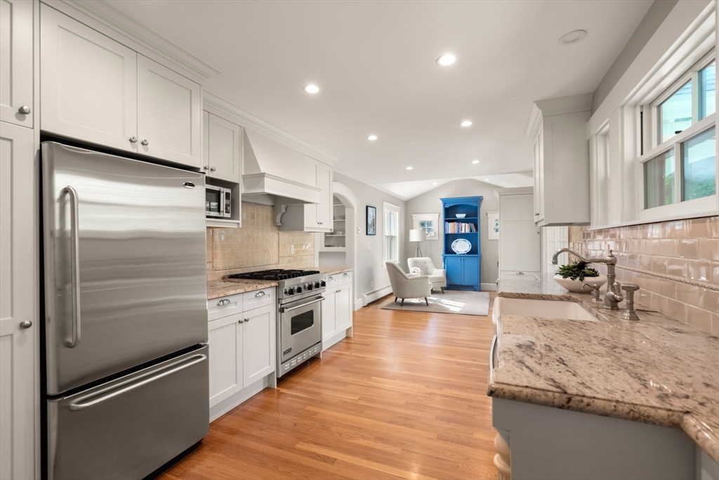 39 Ingraham Road Wellesley, MA 02482 - Photo 6 of 30 a kitchen with granite countertop stainless steel appliances and a counter space