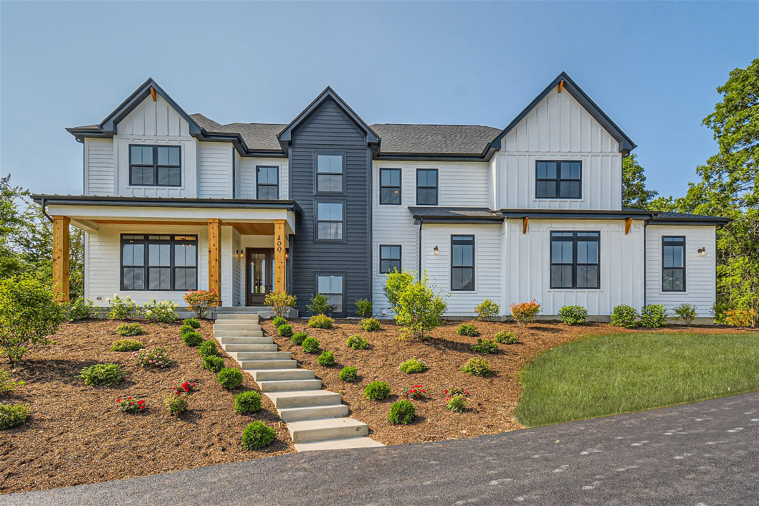 front view of a house with a yard