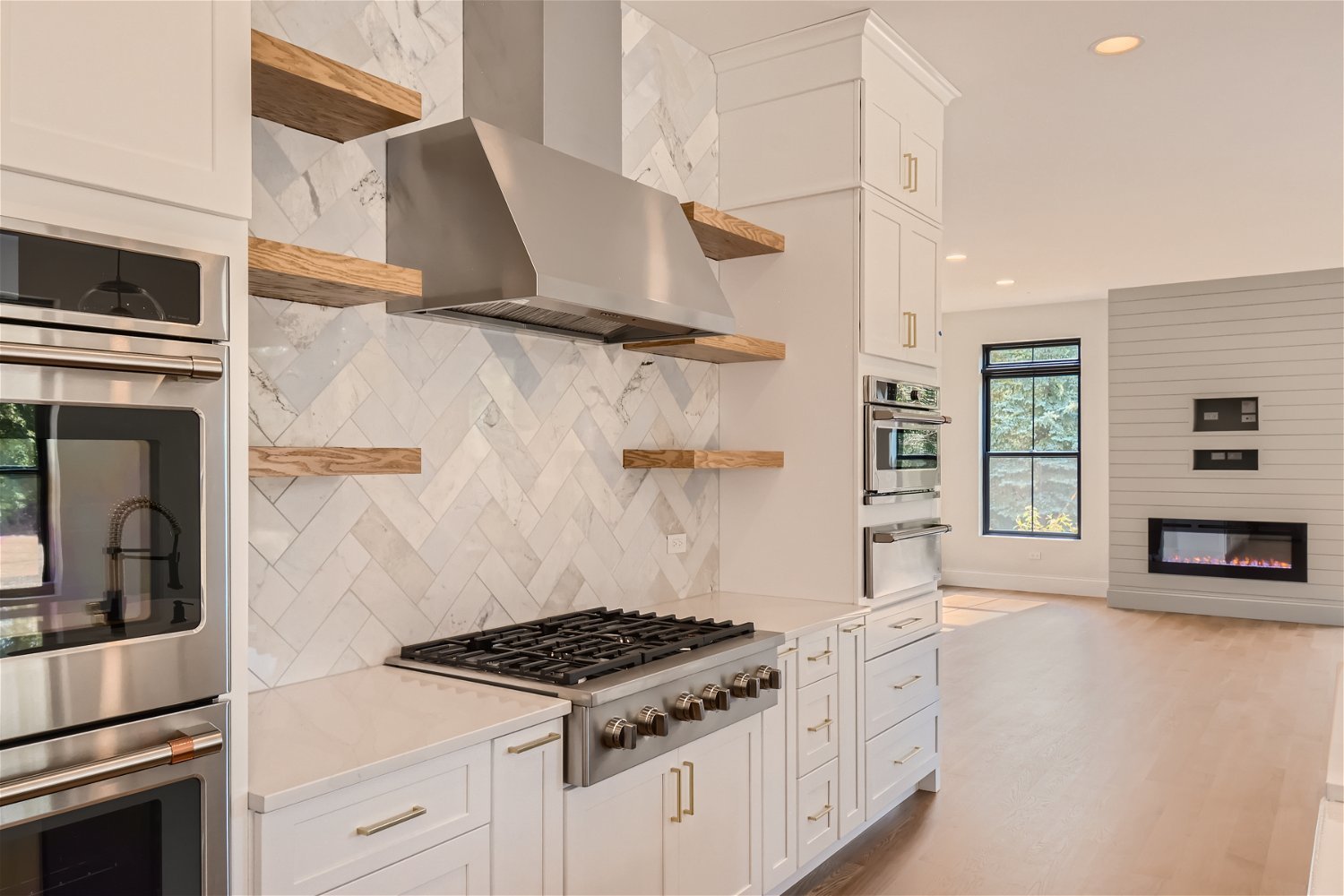 8 Alexandra Drive Mettawa, IL 60048 - Photo 11 of 30 a kitchen with granite countertop a stove and a refrigerator