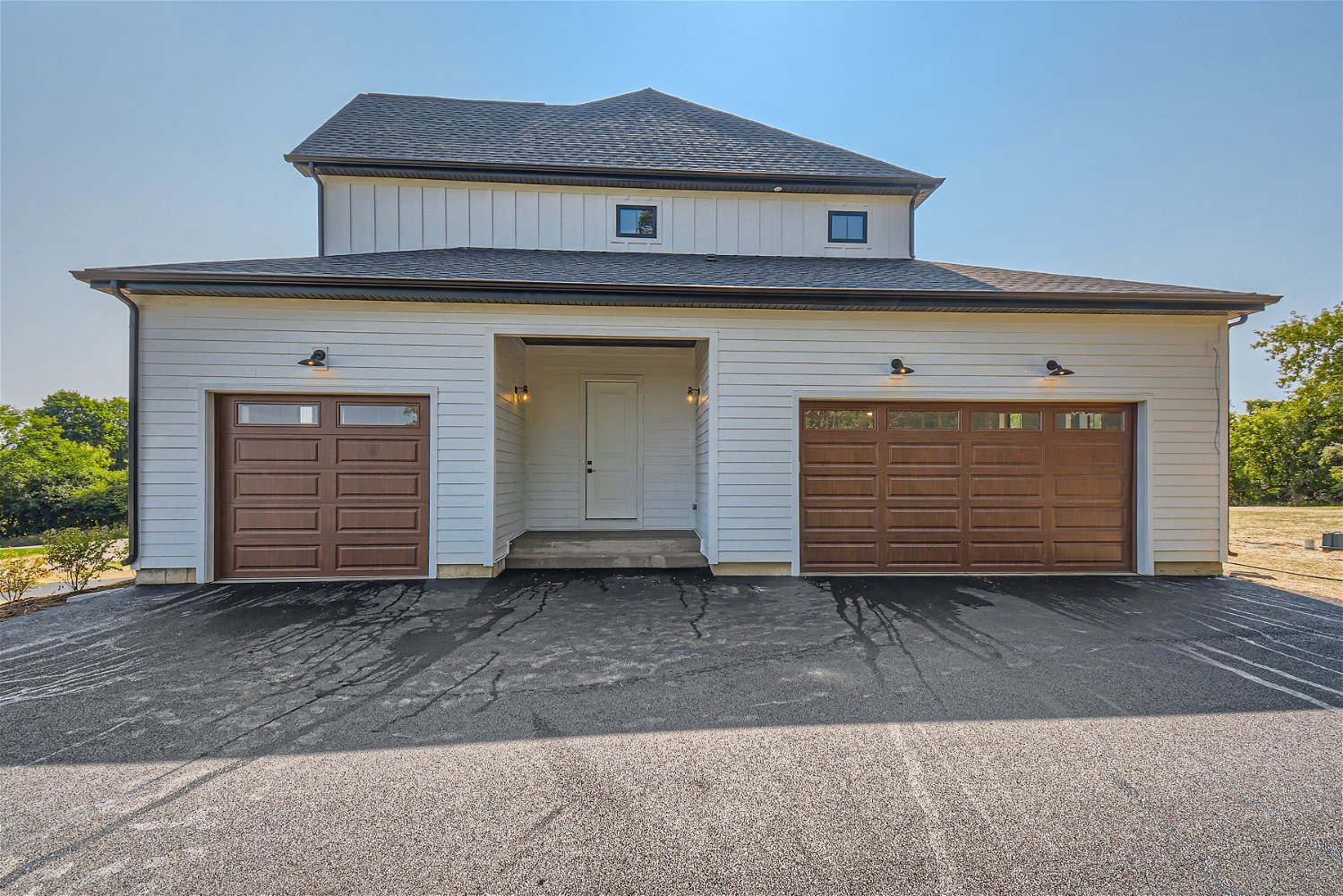 8 Alexandra Drive Mettawa, IL 60048 - Photo 28 of 30 a front view of a house with a garage