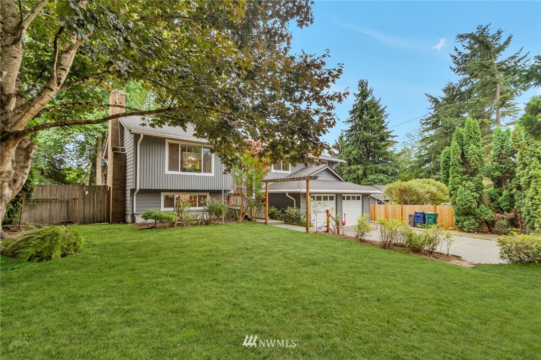 20619 Filbert Drive Bothell, WA 98012 - Photo 14 of 30 a front view of a house with a garden