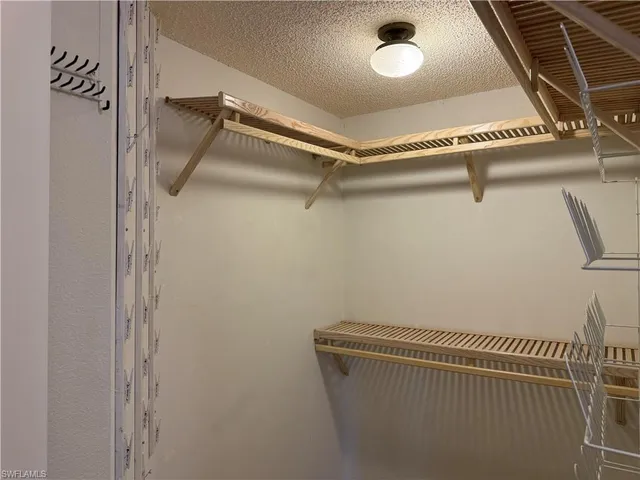 a view of a room with rack on the wall