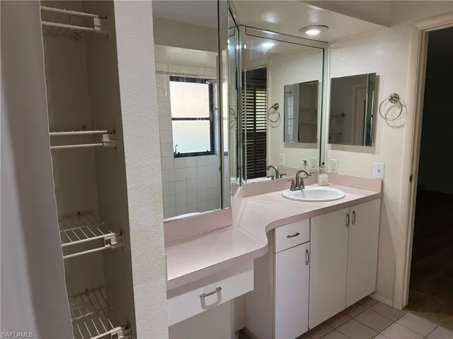 a workspace with furniture and a window