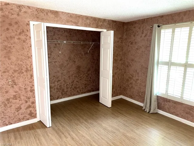 a bathroom with 2 sink and a mirror