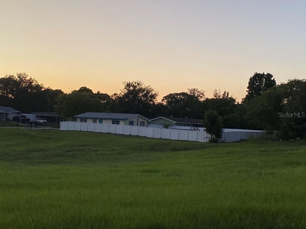 4544 Cynthia Lane Spring Hill, FL 34606 - Photo 30 of 35 a view of a grassy area