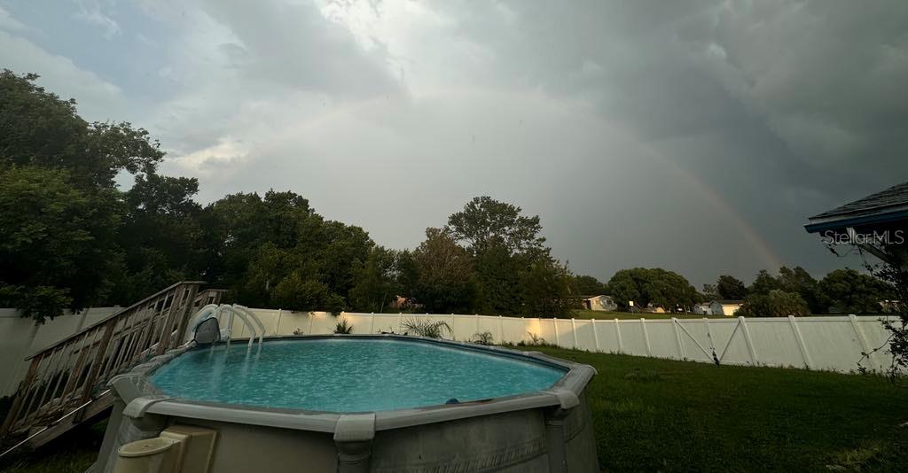 4544 Cynthia Lane Spring Hill, FL 34606 - Photo 31 of 35 a view of backyard with entertaining space