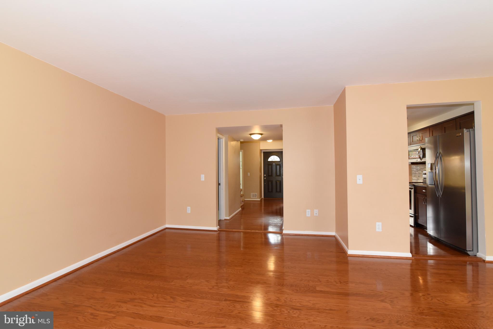 2334 Generation Drive Reston, VA 20191 - Photo 19 of 55 A view from the living room toward the front hall.