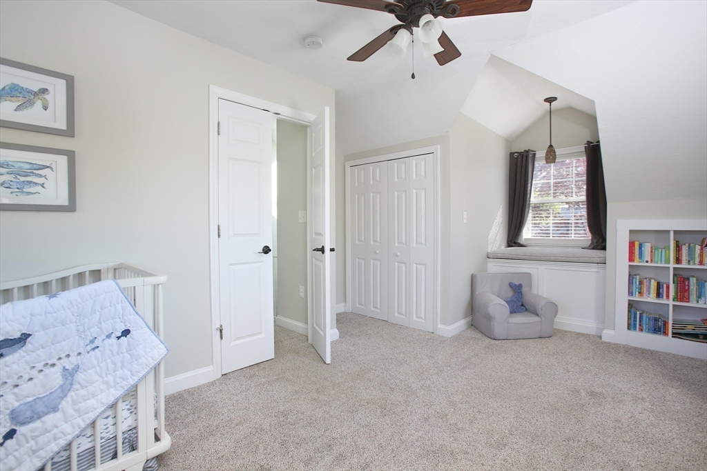 44 Brae Road Weymouth, MA 02191 - Photo 12 of 24 a bedroom with a bed and cabinets
