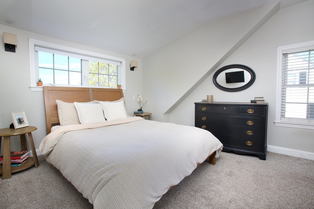 44 Brae Road Weymouth, MA 02191 - Photo 16 of 24 a bedroom with a bed and a window