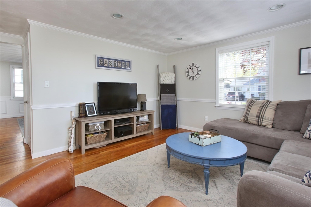 44 Brae Road Weymouth, MA 02191 - Photo 7 of 24 a living room with furniture and a flat screen tv