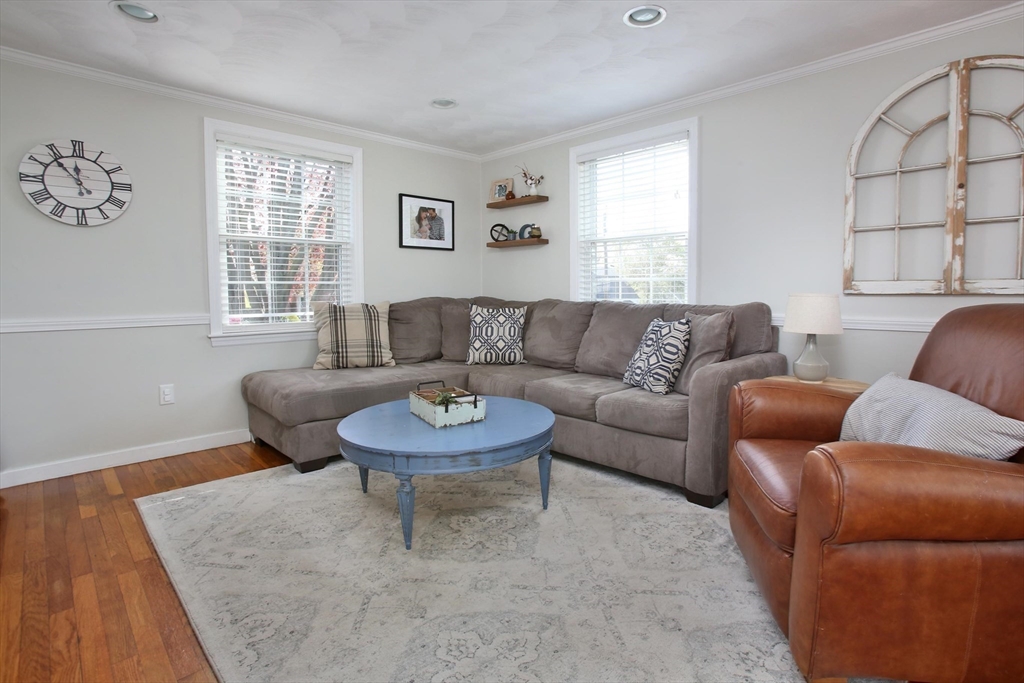 44 Brae Road Weymouth, MA 02191 - Photo 8 of 24 a living room with furniture and a large window