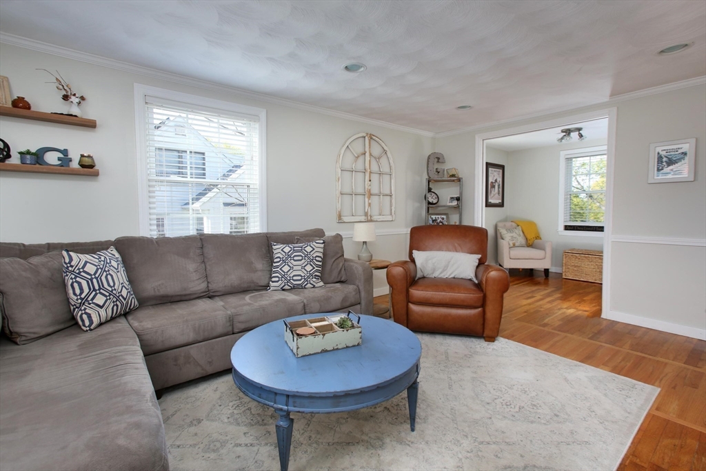 44 Brae Road Weymouth, MA 02191 - Photo 9 of 24 a living room with furniture and a rug