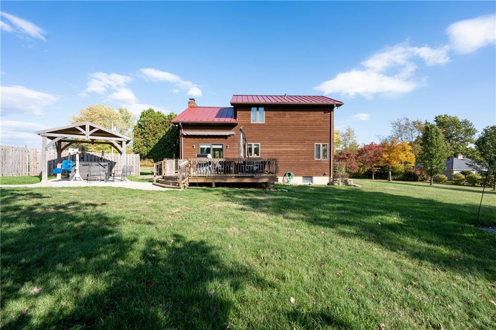 287 Ruffsdale Road Ruffs Dale, PA 15679 - Photo 17 of 21 a view of a house with a back yard