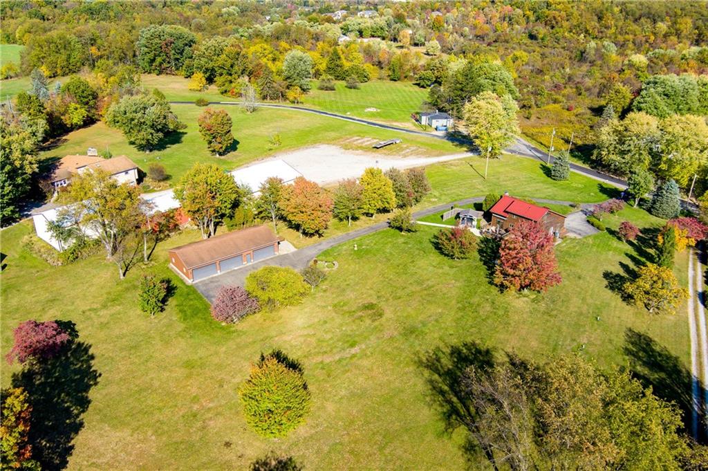 287 Ruffsdale Road Ruffs Dale, PA 15679 - Photo 19 of 21 a view of a lake with a houses