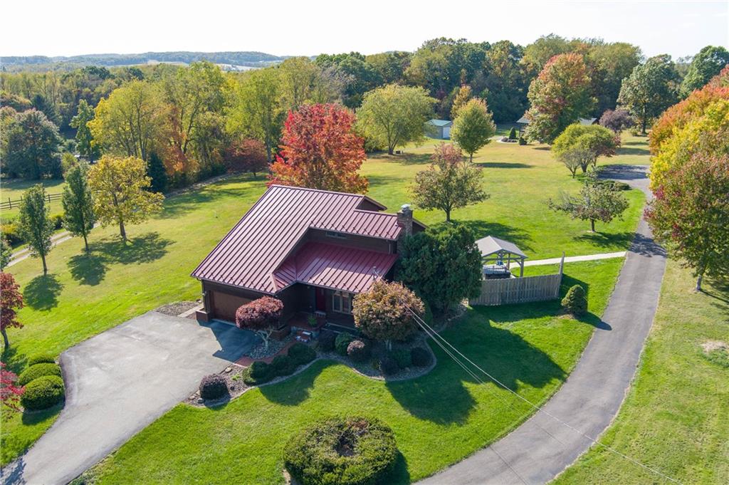 287 Ruffsdale Road Ruffs Dale, PA 15679 - Photo 2 of 21 an aerial view of a house with yard swimming pool and outdoor seating