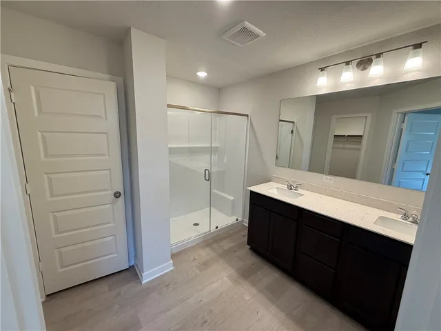 a view of an empty walk in closet