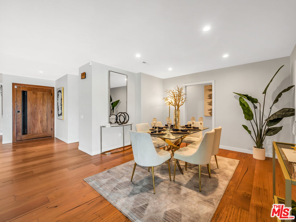 26077 Farmfield Road Calabasas, CA 91302 - Photo 4 of 45 a view of a dining room with furniture and wooden floor