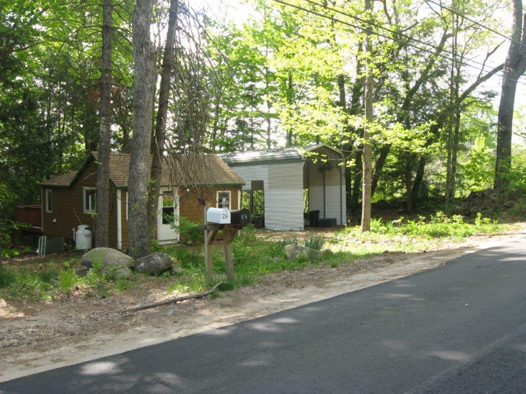 24 Demeritt Road Newfield, ME 04095 - Photo 3 of 19 3. Left side of Camp - 24 Demeritt